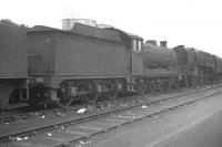 Class O4 2-8-0 no 63818 stands on its home shed at Doncaster on 22 May 1966, four weeks after withdrawal, as does BR Standard class 9F 2-10-0 no 92172. Both locomotives were broken up in the scrapyard of Messrs W George, Station Steel, Wath-on-Dearne, a month later.<br><br>[K A Gray 22/05/1966]