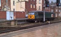 Gosh, is that the time? The old station clock can be seen on the left, at the Brunswick Inn end of Derby station. The loco is Devon and Cornwall Railway's 56.303.<br><br>[Ken Strachan 07/12/2017]