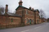 The former station building at Cowbit complete with poster display boards with a British Railways totem on one and the station name on a totem on the other. <br><br>[John McIntyre 20/02/2018]