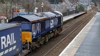 DRS 66302 passing through Pitlochry southbound. ([[See image 48763]] with the same loco.)<br><br>[David Prescott 22/03/2018]