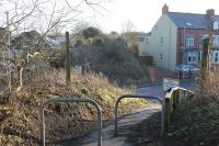 Church Road Halt in Harrington was only open from 1914 to 1926, served by trains from Workington to Lowca. Freight continued after closure until as late as 1973 and part of the line is now accessible as a trackbed footpath. This view looks northwards and the halt itself was on the far side of the road, originally crossed by a steel bridge, but nothing remains. <br><br>[Mark Bartlett 09/03/2018]