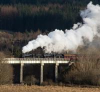 Northbound locos and stock move from Carnforth to Fort William crossing the Fillan Viaduct to the north of Crianlarich station.<br><br>[Ewan Crawford 28/03/2018]