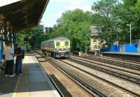 Thameslink 319447 passing Penge West  northbound on 12 July 2002 with a service to Bedford.<br><br>[Ian Dinmore 12/07/2002]