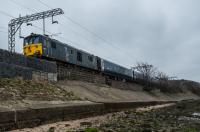 New sleeper coaches approach Cardross on a trial run from Polmadie to Arrochar & Tarbet. A real curiosity on a day when the West Highland is closed south of Crianlarich due to a sink hole between Ardlui and Arrochar & Tarbet.<br><br>[Ewan Crawford 11/04/2018]