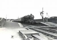 Jubilee 4-6-0 no 45673 <I>Keppel</I> runs north through New Cumnock on 29 July 1961 at the head of a Birmingham - Glasgow express. <br><br>[G H Robin collection by courtesy of the Mitchell Library, Glasgow 29/07/1961]