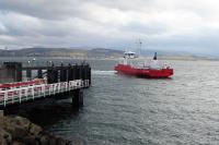 Western Ferries <I>MV Sound of Scarba</I> arrives at McInroys Point near Gourock after another Clyde crossing from Hunters Quay on 31st March 2018. In the background, across the water, the houses of Kilcreggan can be seen. <br><br>[Mark Bartlett 31/03/2018]