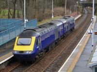 Scotrail power cars 43127 and 43145 speed through Dalgety Bay on their way from Newcastle to Inverness on 3rd April 2018.<br>
<br>
<br><br>[Bill Roberton 03/04/2018]