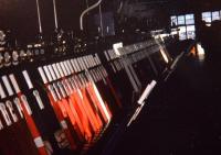 The interior of Aberdeen South Signal Box illuminated by the rapidly sinking winter sun. Taken during a visit by the AURS to the then 3 remaining boxes around the Joint Station in 1980, the year before closure. [Ref query 15 April 2018]<br><br>[Charlie Niven /02/1980]
