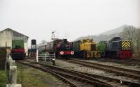 Ex NCB 0-6-0ST S.121 brings a train back to Embsay on 30 March 1991. On the right is an ex CEGB Barclay shunter and next to that is ex BR Class 14 D9513, preserved as NCB No 38 [See image 48205].<br><br>[John McIntyre 30/03/1991]