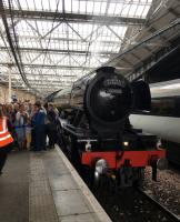 <h4><a href='/locations/E/Edinburgh_Waverley'>Edinburgh Waverley</a></h4><p><small><a href='/companies/N/North_British_Railway'>North British Railway</a></small></p><p>The Flying Scotsman simmers at platform 20 on return to Waverley from a Fife Circle trip. 109/132</p><p>21/05/2018<br><small><a href='/contributors/Martin_MacGuire'>Martin MacGuire</a></small></p>