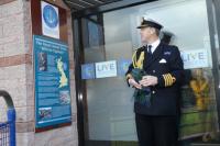 Captain Chris Smith checks out the plaque that he has just unveiled at Hawick Leisure Centre on 30th November 2018. The centre stands on the site of Hawick Station. <I>The Jellicoe Express,</I> which ran between Euston and Thurso, was the longest rail journey in Britain and operated during both world wars transporting mail and navy personnel. It is being commemorated with a series of plaques. Hawick, on the old Waverley Line, was a station where the Express called in one direction for coal and water and now is the only Jellico location that no longer has trains. <br>
