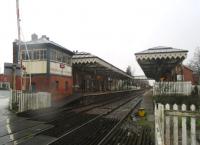 <h4><a href='/locations/H/Hale'>Hale</a></h4><p><small><a href='/companies/C/Cheshire_Midland_Railway'>Cheshire Midland Railway</a></small></p><p>Hale station on Chester to Stockport line, looking north from the level crossing, on a dismal 7th April 2016.   Trains generally run through from Chester to Manchester Piccadilly although a few occasionally terminate at Stockport.    The signal box is no longer in use. [Ref query 11 January 2019] 5/23</p><p>07/04/2016<br><small><a href='/contributors/David_Bosher'>David Bosher</a></small></p>