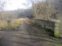 <h4><a href='/locations/N/Neidpath_Viaduct'>Neidpath Viaduct</a></h4><p><small><a href='/companies/S/Symington,_Biggar_and_Broughton_Railway'>Symington, Biggar and Broughton Railway</a></small></p><p>The west end of the former Neidpath Viaduct, on the Peebles to Symington line. The line closed to passengers in 1950 and this section to freight in 1954. This view is looking east towards Peebles on 23rd February 2018. 17/46</p><p>23/02/2018<br><small><a href='/contributors/David_Bosher'>David Bosher</a></small></p>