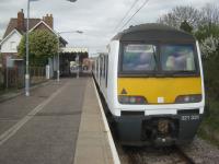 <h4><a href='/locations/S/Southminster'>Southminster</a></h4><p><small><a href='/companies/G/Great_Eastern_Railway'>Great Eastern Railway</a></small></p><p>321331 at Southminster station, terminus of the Crouch Valley Line in Essex, on 5th April 2014. See image <a href='/img/65/354/index.html'>65354</a> of the same location thirty years earlier, since when electrification has forced the platform canopy to be cut back behind the platform edge.  4/12</p><p>05/04/2014<br><small><a href='/contributors/David_Bosher'>David Bosher</a></small></p>