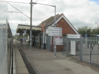 <h4><a href='/locations/S/South_Woodham_Ferrers'>South Woodham Ferrers</a></h4><p><small><a href='/companies/'/New_Essex_Branch,_Wickford_to_Southminster_Great_Eastern_Railway'>'New Essex' Branch, Wickford to Southminster (Great Eastern Railway)</a></small></p><p>South Woodham Ferrers station in Essex, seen from 321 331 calling with a Crouch Valley Line service from Southminster to Wickford, on 5th April 2014. The station was just plain Woodham Ferrers until 2007 and was once the junction for Maldon, closed to passengers in 1939 and freight in 1953.  It was also a passing place but the loop has been removed, leaving traces of an abandoned platform opposite, behind the train.  The loop at Burnham-on-Crouch station has also been removed so that, for many years now, trains can only pass at the one remaining loop at North Fambridge station, as renamed from plain Fambridge in 2007. 7/8</p><p>05/04/2014<br><small><a href='/contributors/David_Bosher'>David Bosher</a></small></p>