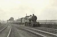 2P 4-4-0 no 40579 at Port Eglinton Junction on 25 April 1959 with a Largs - Glasgow train.  