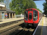 <h4><a href='/locations/C/Chalfont_and_Latimer'>Chalfont and Latimer</a></h4><p><small><a href='/companies/M/Metropolitan_Railway'>Metropolitan Railway</a></small></p><p>LUL S8 stock on a Metropolitan Line service to Amersham arriving at its penultimate stop at Chalfont & Latimer station in Buckinghamshire, junction for the Chesham branch, on 27th May 2013. 6/21</p><p>27/05/2013<br><small><a href='/contributors/David_Bosher'>David Bosher</a></small></p>