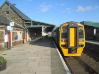 <h4><a href='/locations/B/Barmouth'>Barmouth</a></h4><p><small><a href='/companies/A/Aberystwyth_and_Welch_Coast_Railway'>Aberystwyth and Welch Coast Railway</a></small></p><p>158 824 from Pwllheli to Machynlleth at Barmouth station on the evening of 23rd May 2016. 26/75</p><p>23/05/2016<br><small><a href='/contributors/David_Bosher'>David Bosher</a></small></p>