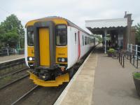 <h4><a href='/locations/H/Hoveton_and_Wroxham'>Hoveton and Wroxham</a></h4><p><small><a href='/companies/E/East_Norfolk_Railway'>East Norfolk Railway</a></small></p><p>156 402 from Norwich to Sheringham, reversing at Cromer, at Hoveton & Wroxham station on 30th May 2016.  Ironically, at a time when the old BR regime were shortening station names with an '&' in them, e.g. Cholsey & Moulsford to just Cholsey, here an '&' was added as the station was previously known simply as Wroxham.  Behind where I was standing to take this photo, a few yards away on the right, is the terminus of the miniature Bure Valley Railway to Aylsham, along the trackbed of a former standard gauge line. 2/10</p><p>30/05/2016<br><small><a href='/contributors/David_Bosher'>David Bosher</a></small></p>