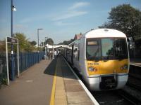 <h4><a href='/locations/C/Charlton_NKR'>Charlton [NKR]</a></h4><p><small><a href='/companies/N/North_Kent_Railway'>North Kent Railway</a></small></p><p>376006, heading for Dartford via Woolwich Arsenal, at Charlton on 26th September 2009. This station opened with the North Kent Line on 30th July 1849, which diverged from London's first railway, the London & Greenwich of 1836, south-east of London Bridge and pursued a roundabout route through Lewisham and Blackheath before returning to the south bank of the Thames at Charlton. Greenwich was left as a terminus until 1st January 1873 when the line was extended to Maze Hill, then a further extension on 1st February 1878 which joined the North Kent Line west of Charlton. This then offered a shorter route to London from the North Kent stations east of Charlton via Greenwich but trains also continued to run via Lewisham as they still do to this day. 2/7</p><p>26/09/2009<br><small><a href='/contributors/David_Bosher'>David Bosher</a></small></p>