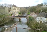 <h4><a href='/locations/S/Summerseat_Viaduct'>Summerseat Viaduct</a></h4><p><small><a href='/companies/E/East_Lancashire_Railway'>East Lancashire Railway</a></small></p><p>View from East Lancashire Railway train from Bury Bolton Street to Rawtenstall, crossing Summerseat Viaduct over the River Irwell, on 5th April 2016. The road bridge, and the building that used to stand on it, were devastated during flooding in 2015. Since that time the bridge has only been available for pedestrian use.  11/44</p><p>05/04/2016<br><small><a href='/contributors/David_Bosher'>David Bosher</a></small></p>