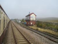 <h4><a href='/locations/B/Blea_Moor_Signal_Box'>Blea Moor Signal Box</a></h4><p><small><a href='/companies/S/Settle_and_Carlisle_Line_Midland_Railway'>Settle and Carlisle Line (Midland Railway)</a></small></p><p>UK Railtours' excursion passing Blea Moor signal box on the Settle & Carlisle Line, on 3rd October 2015. 23/23</p><p>03/10/2015<br><small><a href='/contributors/David_Bosher'>David Bosher</a></small></p>