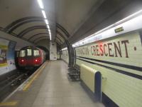 <h4><a href='/locations/M/Mornington_Crescent'>Mornington Crescent</a></h4><p><small><a href='/companies/C/Charing_Cross,_Euston_and_Hampstead_Railway'>Charing Cross, Euston and Hampstead Railway</a></small></p><p>LUL 1995 stock with a Northern Line service to Kennington via Charing Cross departing from Mornington Crescent station on 5th January 2019. This station was cited for closure by London Transport in 1958 but was reprieved although it was closed at weekends from 1970. On 23rd October 1992, it was temporarily closed for refurbishment and rebuilding of the lifts and reopened full-time on 27th April 1998. Until 1966, trains to the Edgware branch of the Northern Line passed through without stopping. 27/87</p><p>05/01/2019<br><small><a href='/contributors/David_Bosher'>David Bosher</a></small></p>