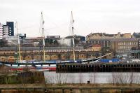 View over the Govan dry docks and entry to the former Queens Dock of train passing Yorkhill.<br><br>[Ewan Crawford 07/03/2006]