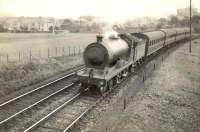 Kilmarnock local via Paisley near Crookston. G&SW 4-4-0 14518. Summer 1935.<br><br>[G H Robin collection by courtesy of the Mitchell Library, Glasgow //1935]