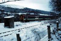 Glasgow bound at Glen Douglas. The signalbox has gone.<br><br>[Ewan Crawford //]