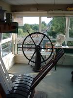 Lever frame and wheel for the crossing gates in Fiskerton Junction box.<br><br>[Ewan Crawford //]