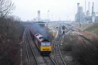 Loaded iron ore train leaves Immingham for Scunthorpe. Passing the Humber Refinery at Ulceby Gate.<br><br>[Ewan Crawford //]