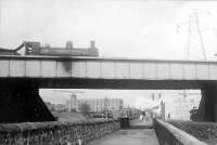 C.R. 0.6.0 57562 on Renfrew District crossing the G&S.W. to Wharf station.<br><br>[G H Robin collection by courtesy of the Mitchell Library, Glasgow 16/04/1953]