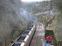 Work in progress on securing the sides of the steep cutting between Craiglockhart and Morningside on the Edinburgh sub in March 2006 with generators and other equipment located on the old westbound platform of Craiglockhart station.<br><br>[John Furnevel 21/03/2006]