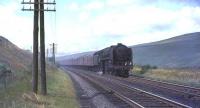 70032 <I>Tennyson</I> descending towards Harthope with up ecs on 31 July 1965.<br><br>[John Robin 31/07/1965]