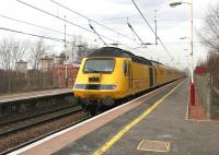 The Network Rail monitoring and measurement train speeds south through Shieldmuir station in March 2006.<br><br>[John Furnevel 22/03/2006]