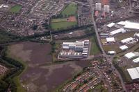 Aerial view of Whifflet (top right) to Carnbroe (left). The route of the W&CR is clear but also here was the M&KR running from bottom centre to the works (centre) and then to Whifflet (top right). Note the sidings still in the works.<br><br>[Ewan Crawford //]