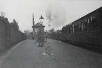 Upper Helensburgh station. 2.6.0 1764 Loch Laggan on freight crossing NB 4.4.2T 67460 on Arrochar Push-Pull.<br><br>[G H Robin collection by courtesy of the Mitchell Library, Glasgow 21/09/1948]