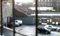 The exit from platform 1 into the north side car park at Haymarket station on 26 March 2006. Taken through the metal fence along Haymarket Terrace, prior to commencement of work on the station's new bay platform 0.<br><br>[John Furnevel 26/03/2006]