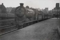 Trains at Hyndland station, July 1949. Ex-NB J37 0.6.0 64584.<br><br>[G H Robin collection by courtesy of the Mitchell Library, Glasgow 22/07/1949]