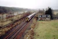 Northbound in the bucketing rain at Ballinluig. Aberfeldy line ran off to the right.<br><br>[Ewan Crawford //]