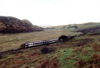 West, but untimately southbound, train near the former Acheilidh Crossing.<br><br>[Ewan Crawford //]