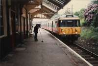 Dynamism at Pollokshields West. Stationmaster takes a break from clearing the platform.<br><br>[Ewan Crawford //]