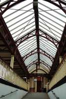 Up ramp to the platforms at Dumbarton Central. You would never guess a Caledonian Railway architect was responsible for the rebuilding of this joint station.<br><br>[Ewan Crawford //]