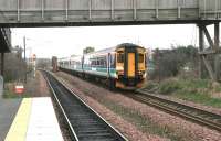 A ScotRail football special turning west on the sub towards Niddrie West Junction after passing south through Brunstane on 2 April 2006. The line to the left leads to Niddrie South and Millerhill.<br><br>[John Furnevel 02/04/2006]