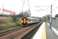 A Waverley - Kings Park football special, in appropriate green & white colours, taking Hibs fans to the cup semi-final at Hampden on 2 April 2006. The special is passing Brunstane on the Edinburgh 'sub'.<br><br>[John Furnevel 02/04/2006]