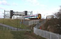 An eastbound train leaving Edinburgh Park in March 2006.<br><br>[John Furnevel 06/03/2006]