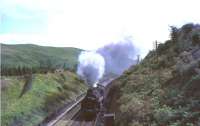 73076 climbs through the cutting at Greskine.<br><br>[John Robin 31/07/1965]