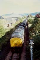 37 hauled Edinburgh to Inverness train passing Bridge of Earn. The junction for the line to Kinross was behind the train.<br><br>[Ewan Crawford //]