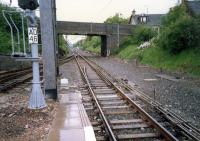 Looking west from the end of the platform at Airdrie. Note point rodding and AD.<br><br>[Ewan Crawford //1987]